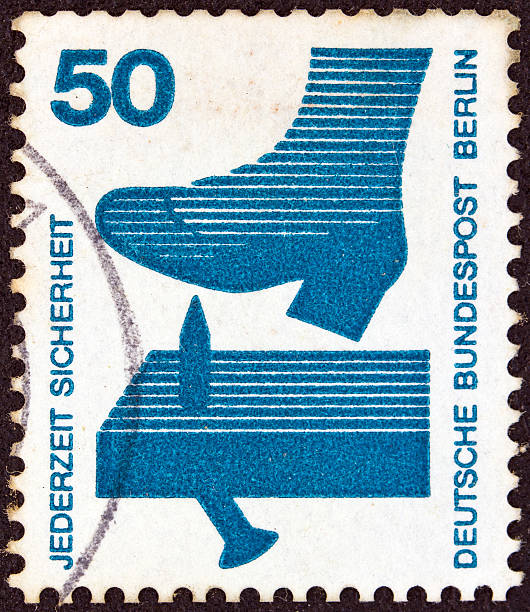istock German stamp shows a protruding nail in plank (1971) 459557025