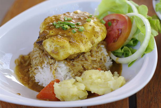 istock rice with hamburg cheese topping brown curry 459562605