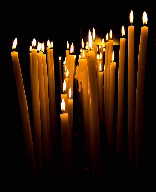 istock long burning candles with mysterious aspect 459564861
