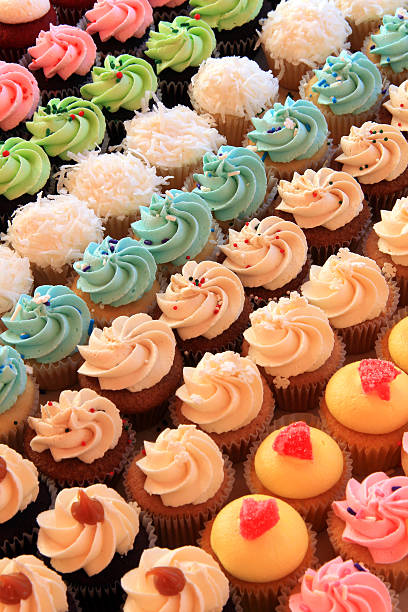 istock A yummy assortment of multi-colored cupcakes 459567319