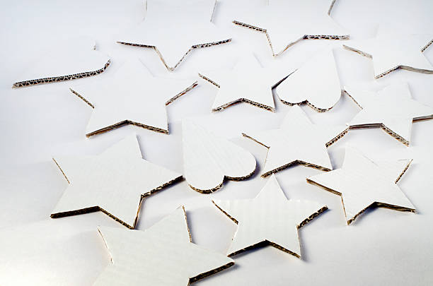 istock white craft paper stars and hearts 459569345