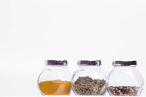istock condiments , allspice, red, white and black pepper 459570557