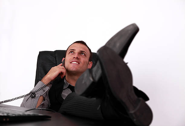 istock Relaxed Young Businessman on the Phone 459587997