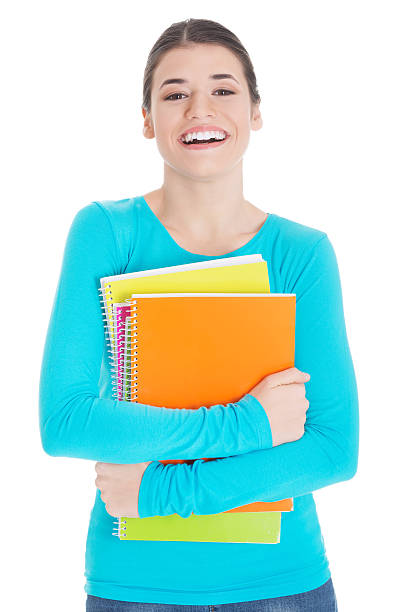 istock Beautiful young woman student with workbook. 459593865