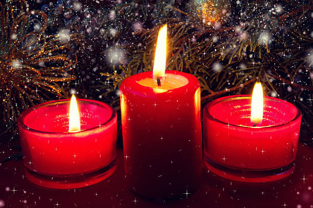 istock beautiful red christmas candles close up 459594053