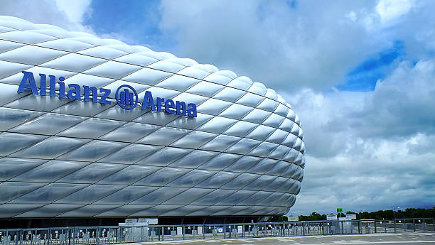 FC Bayern Munchen stadium Munich, Germany - June 10, 2013: Facade of the soccer stadium "Allianz Arena" in Munich - Germany. Constructed of 2,874 foil air panels. Build finished year 2005. FC FC Bayern München home. allianz arena stock pictures, royalty-free photos & images
