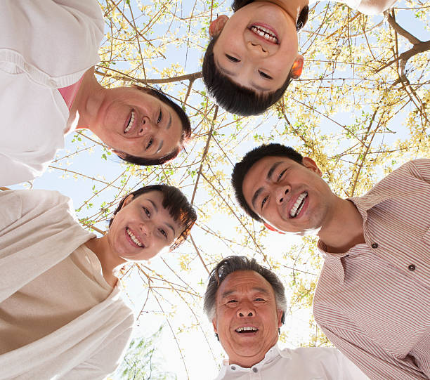 istock Happy smiling family in a circle 459612189
