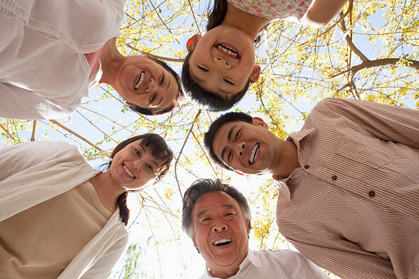 istock Happy smiling family in a circle 459612261