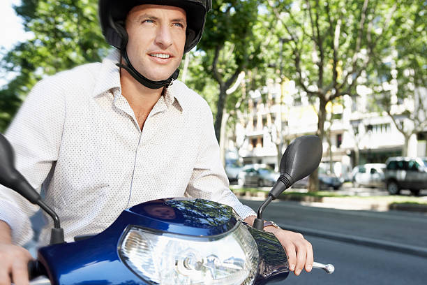 istock Businessman Riding Motor Scooter 459642869