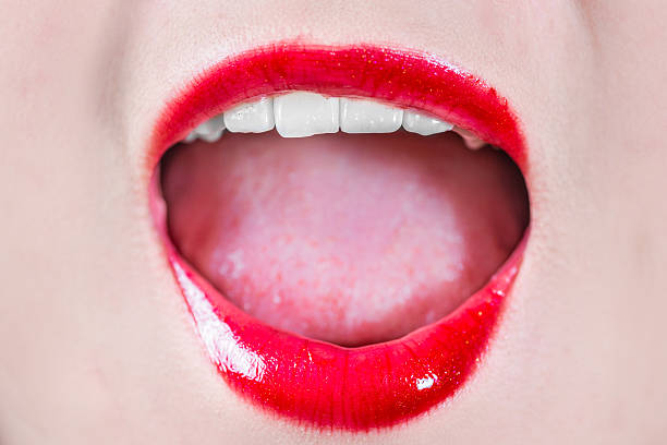 istock Woman lips with makeup laughing 459644495