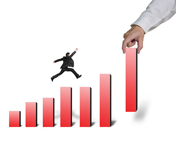 istock Hand hold one red bar and another jumping on chart 459668987