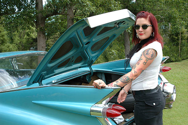 New Zealand red haired girl and her classic car.
