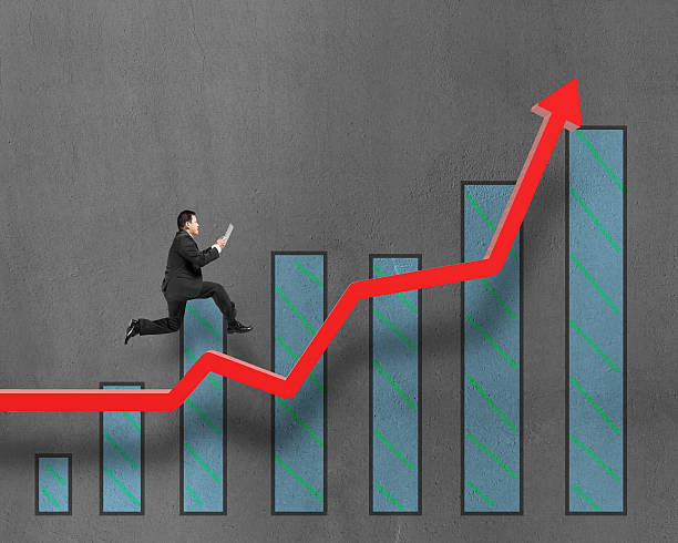 istock Businessman running on growth red arrow with chart 459675483