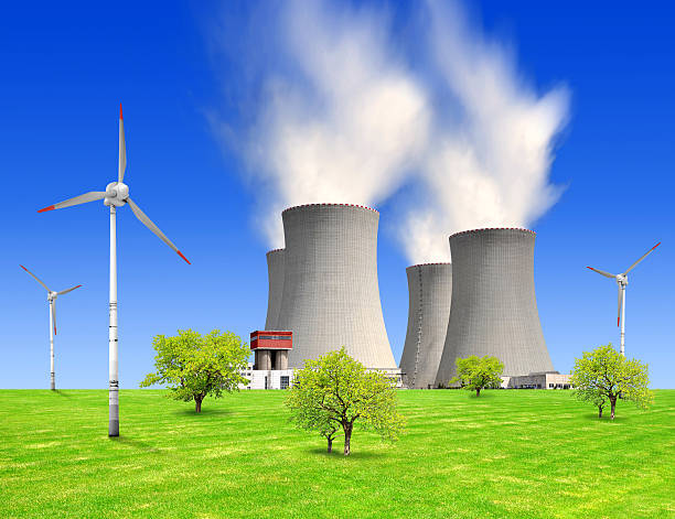istock nuclear power plant and wind turbines 459676275