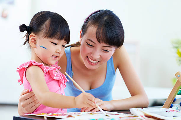 istock little girl learning to drawing 459678089