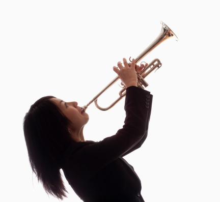Portrait of a Female Trumpet Player - Isolated on White