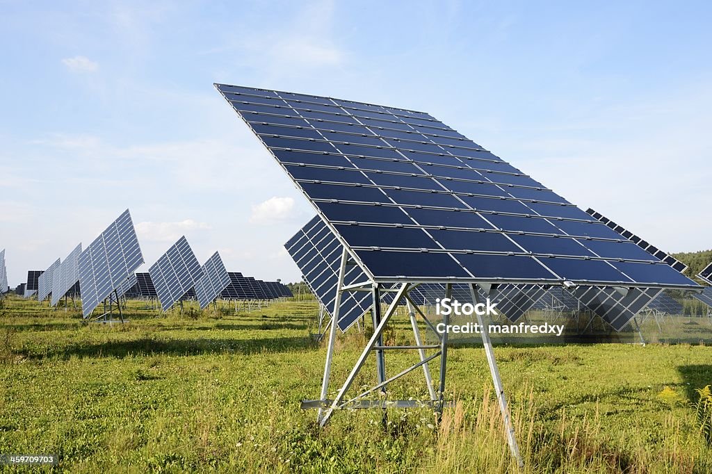 Photovoltaic Solar park with huge solar panels. Electricity Stock Photo