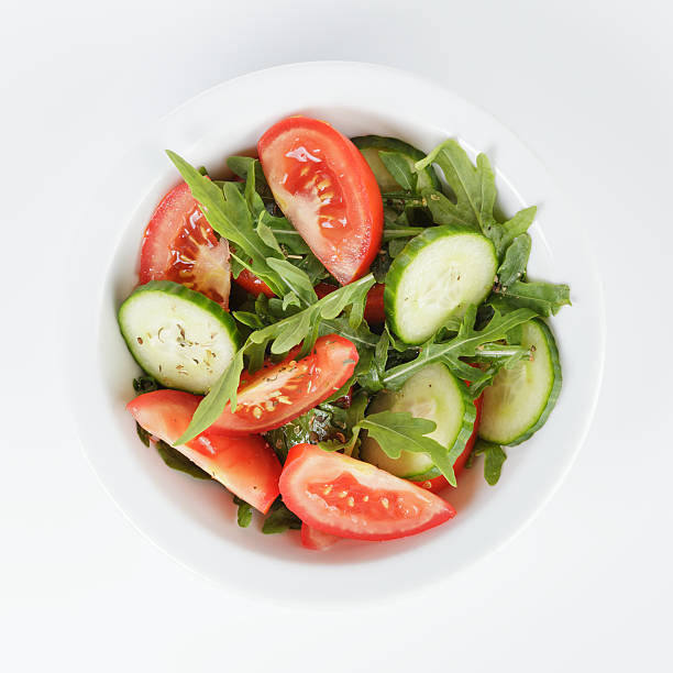 istock served plate with mix salad from tomatoes and cucumbers 459710067