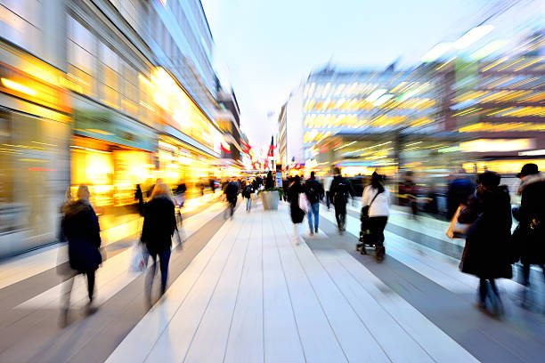 istock Blurred pedestrians in shopping district at Christmas time 459724117