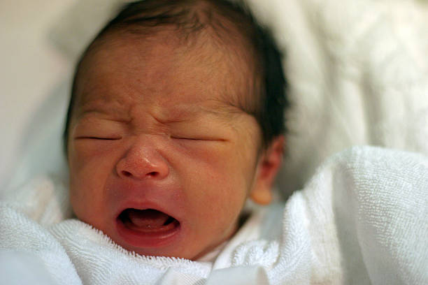 istock Crying newborn baby 459731011