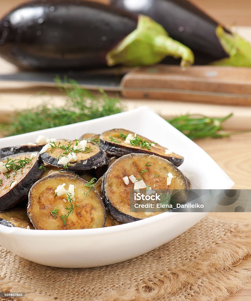 Platter of grilled eggplant with garlic and dill Backgrounds Stock Photo