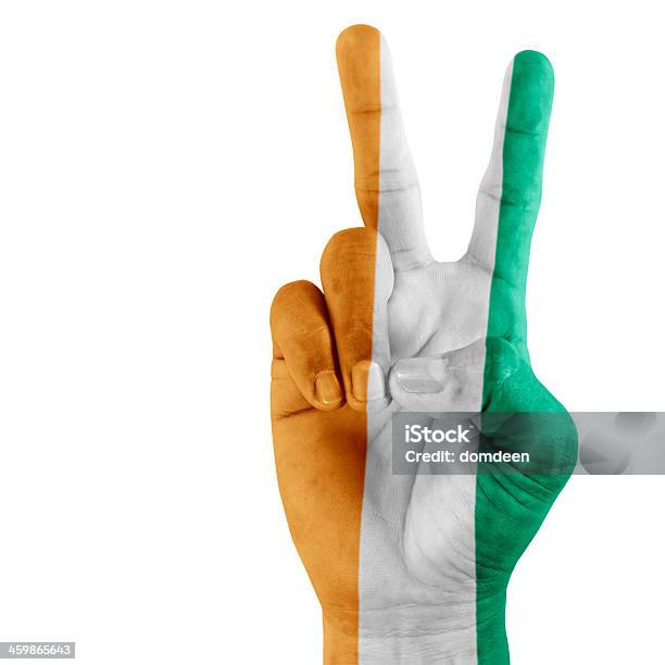 Flag Of Ivory Coast On Victory Hand Stock Photo - Download Image Now - Achievement, Blank, Colors