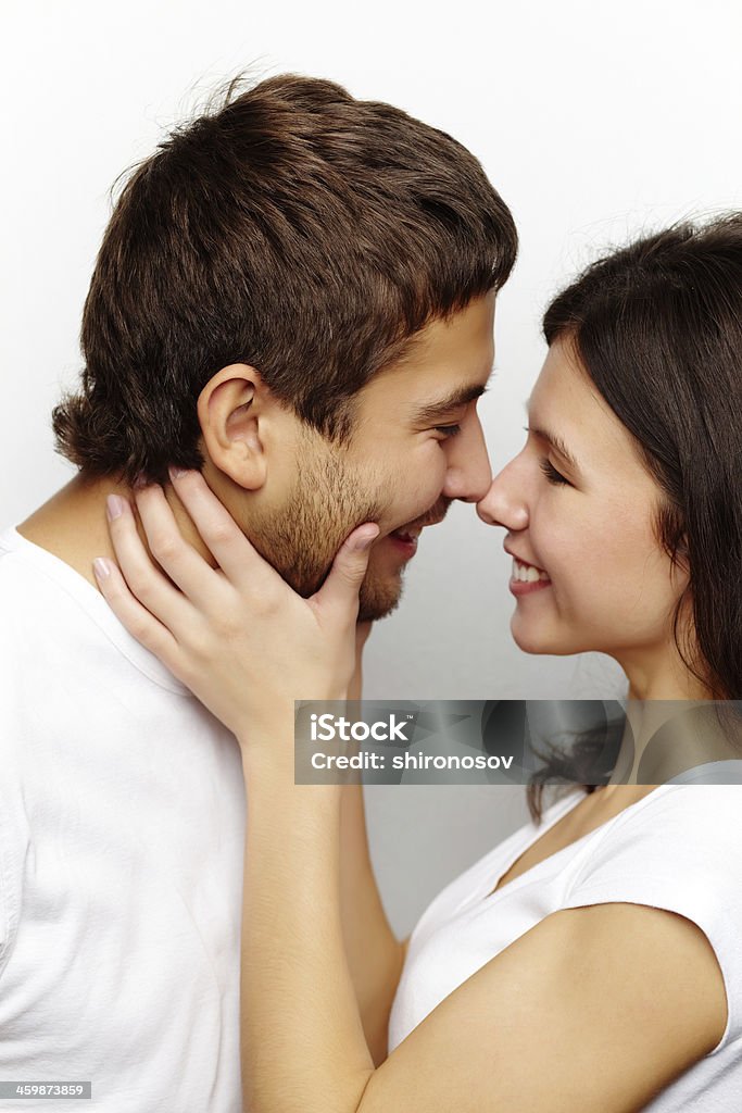 Intimacy Happy woman and her husband looking at one another Adult Stock Photo