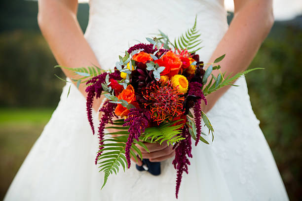 istock Bride Holding Bouquet Flowers 459874489
