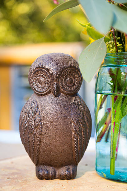 istock Wooden Owls And Flowers 459876255