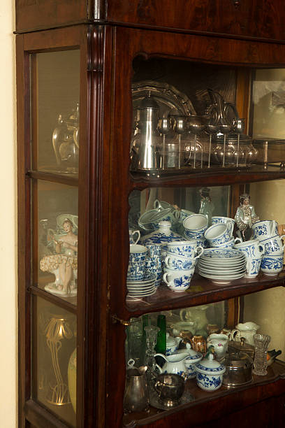 istock Antique dishware silver plated, cups, utensils and china 459876799
