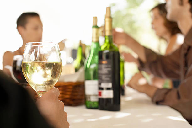 istock Glass Of White Wine On Table At Party 459877191