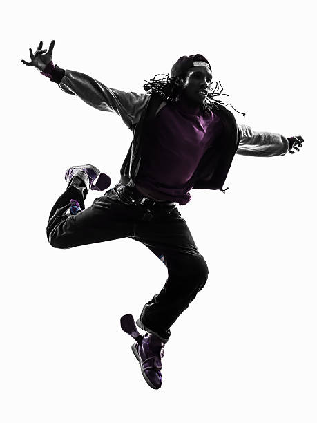 istock hip hop acrobatic break dancer breakdancing young man jumping silhouette 459879777
