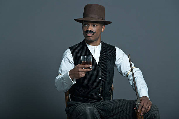 istock Retro afro america western cowboy man with mustache. 459880373