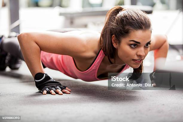 Doing Some Push Ups At The Gym Stock Photo - Download Image Now - Exercising, Latin American and Hispanic Ethnicity, 20-29 Years