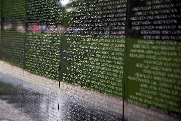 Names of casualties on Vietnam War Veterans Memorial Washington, USA - July 14, 2010: Names of Vietnam war casualties on Vietnam War Veterans Memorial in Washington DC, USA. Names in chronological order,from first casualty in 1959 to last in 1975. names of marbles stock pictures, royalty-free photos & images