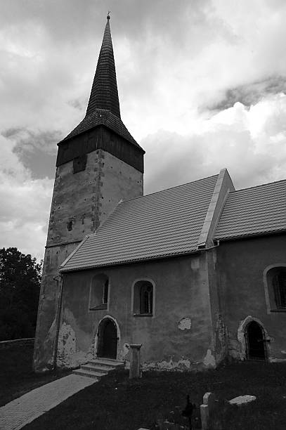 istock stone church and grave 459887553