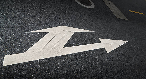 istock city road with arrow sign 459892939