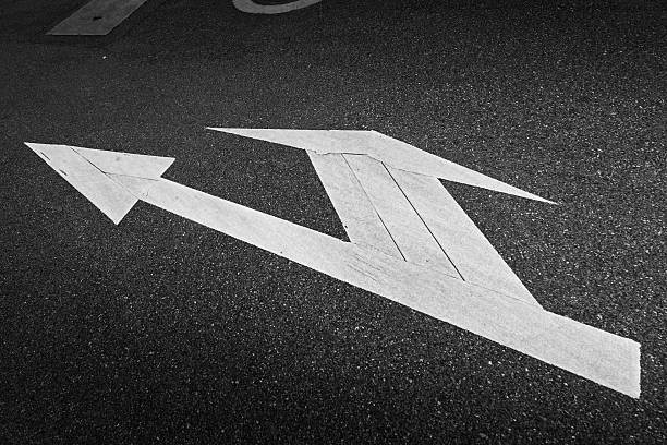 istock city road with arrow sign 459894415