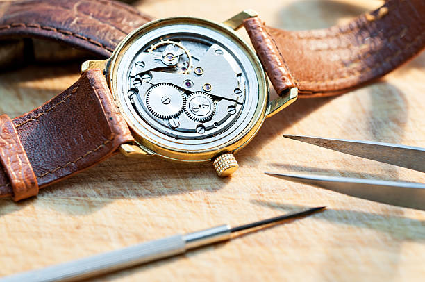 riparazione di orologi - watch maker work tool repairing watch foto e immagini stock