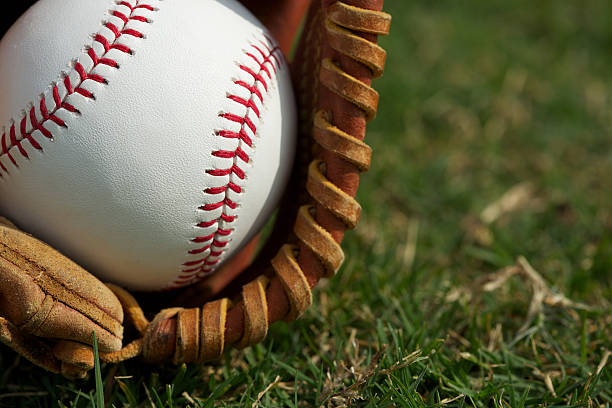 istock Baseball Close Up in a Glove 459899875