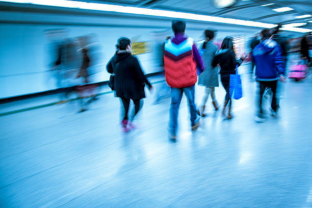 istock business people walk at subway station 459901701