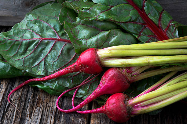 istock Raw Organic Miniature Red Candy Stripe Beets with Swiss Chard 459902805