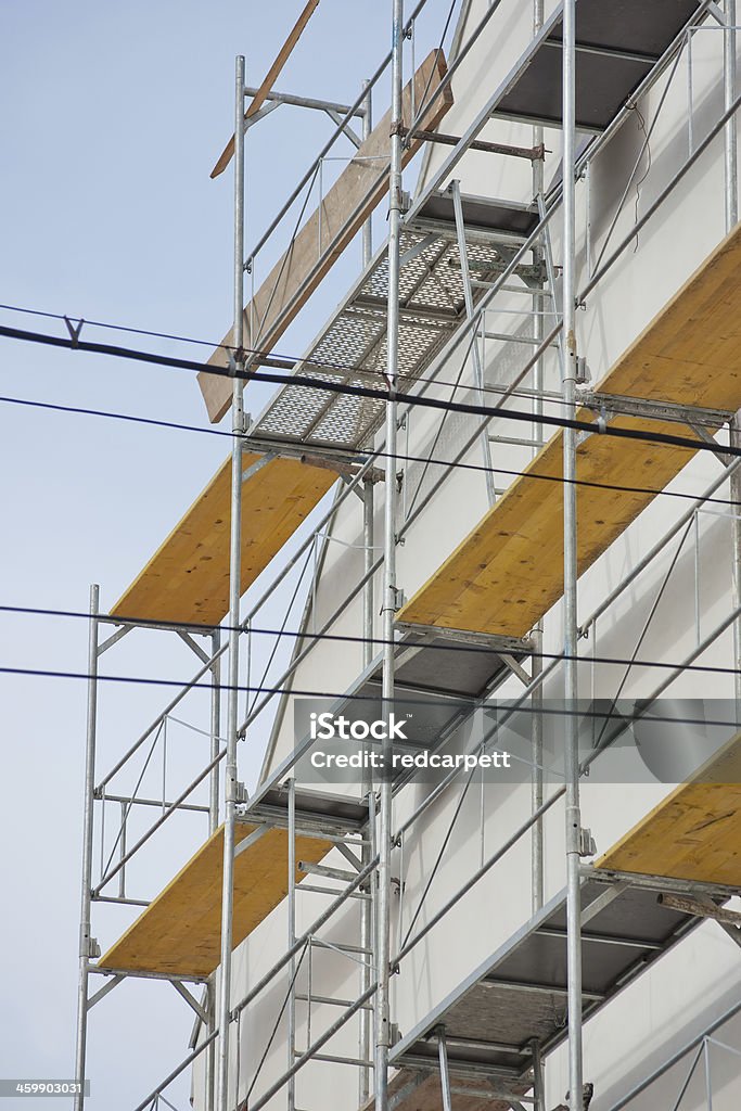 building scaffolding out wood building with scaffolding made of  wood with blue sky Architecture Stock Photo