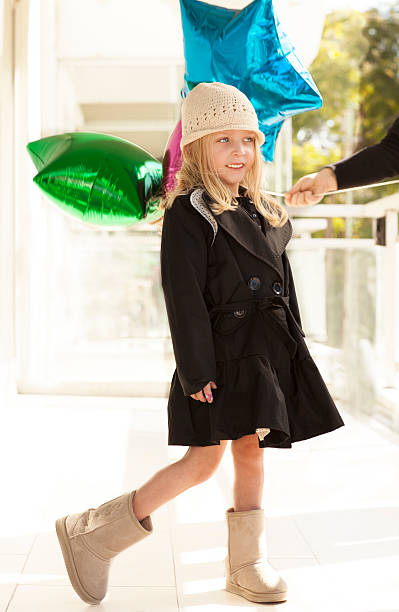 istock Nice blonde girl playing with baloons 459904399