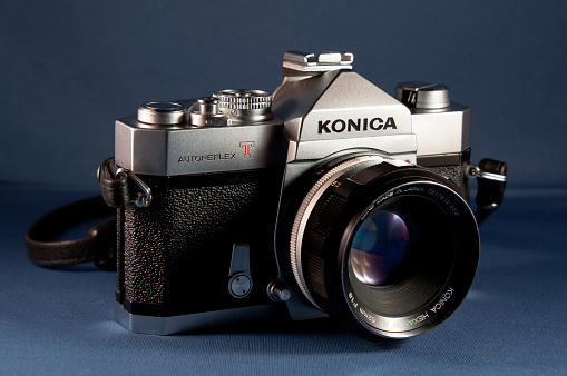 Fonthill, Ontario, Canada - December 20, 2013: An older Konica Reflex T SLR film camera poses in a soft box.