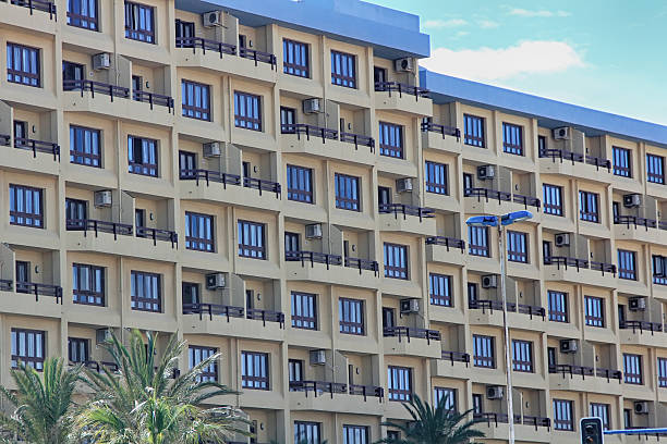 istock modern building full of apartments and many balconies 459907921