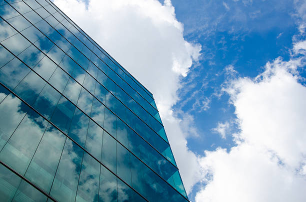 istock skyscraper against sky and building glass background 459911073