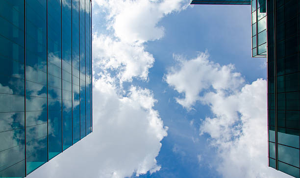 istock skyscraper against sky and building glass background 459911269