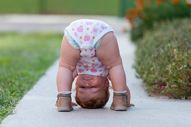 istock Baby is just playing on the street 459912595