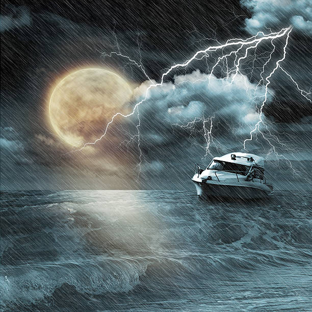 istock Boat in storm  evening on ocean and the moon 459919823